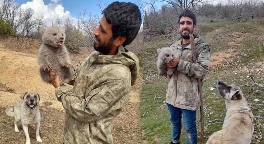 Köpeklerin saldırısından kurtardıkları yavru ayıyı tabiata saldılar